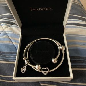 selling 2 different Pandora bangles with charms
